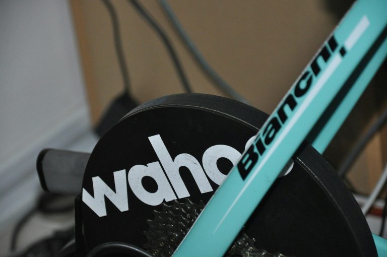 a close up of a bike with a logo on it